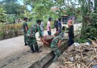 Antisipasi Genangan Air, TNI dan Warga Gotong Royong Bersihkan Drainase di Wonomulyo
