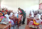Sinergitas Babinsa Koramil 1427-01/Pasangkayu Bersama Yayasan Mitra Wahid Sumut pada Kegiatan Makan Bergizi Gratis dipasangkayu.