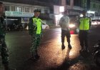 Babinsa Koramil 1402-02/Wonomulyo Bersama Bhabinkamtibmas Gelar Patroli Malam di Desa Banua Baru